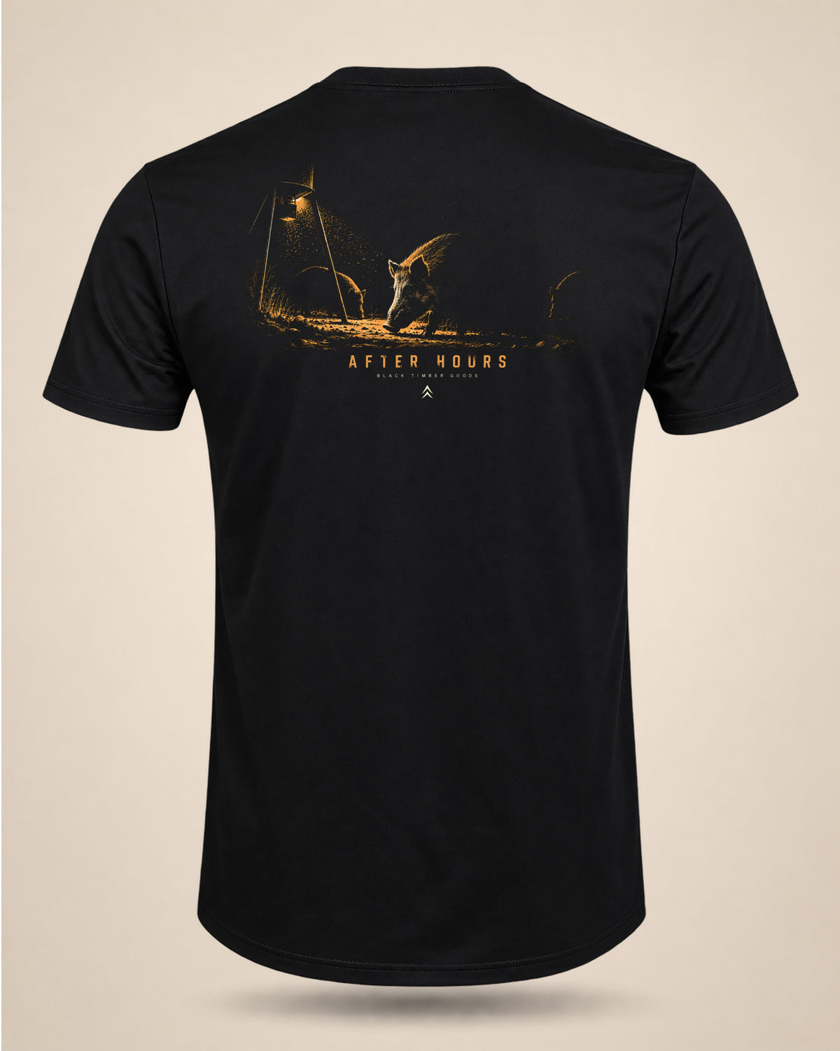 Back view of black After Hours hog hunting t-shirt featuring a wild hog beneath a feeder light