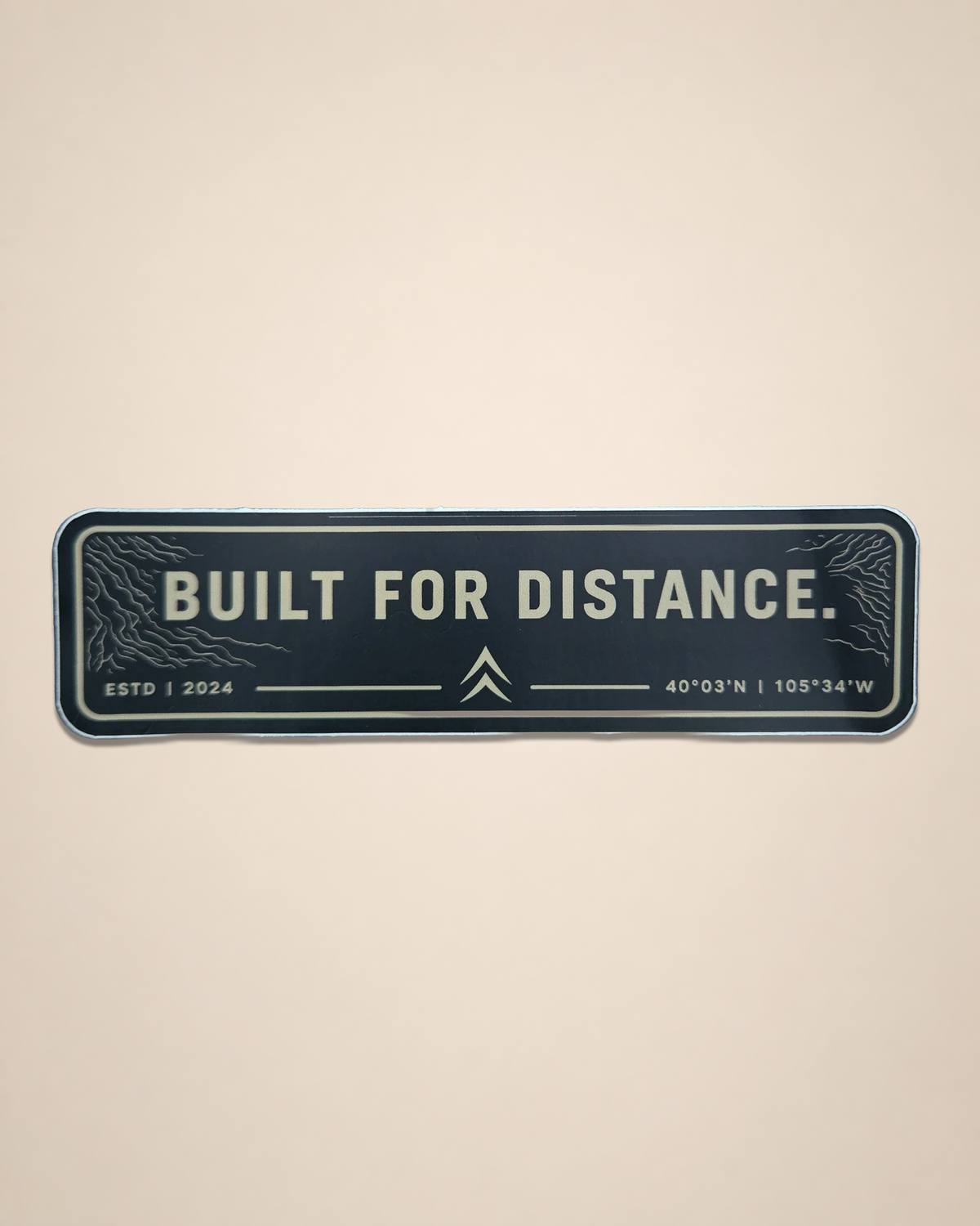 Built For Distance vinyl sticker featuring a rectangular Black Timber outdoor graphic on a cream background.