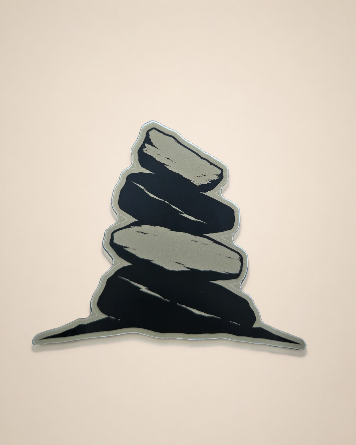 The Long Way In Cairn vinyl sticker featuring a stacked-stone cairn graphic on a cream background.