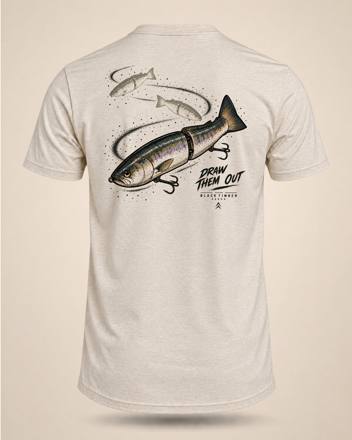 Cream Draw Them Out bass fishing T-shirt featuring a large jointed swimbait graphic with trailing bait silhouettes on the back.