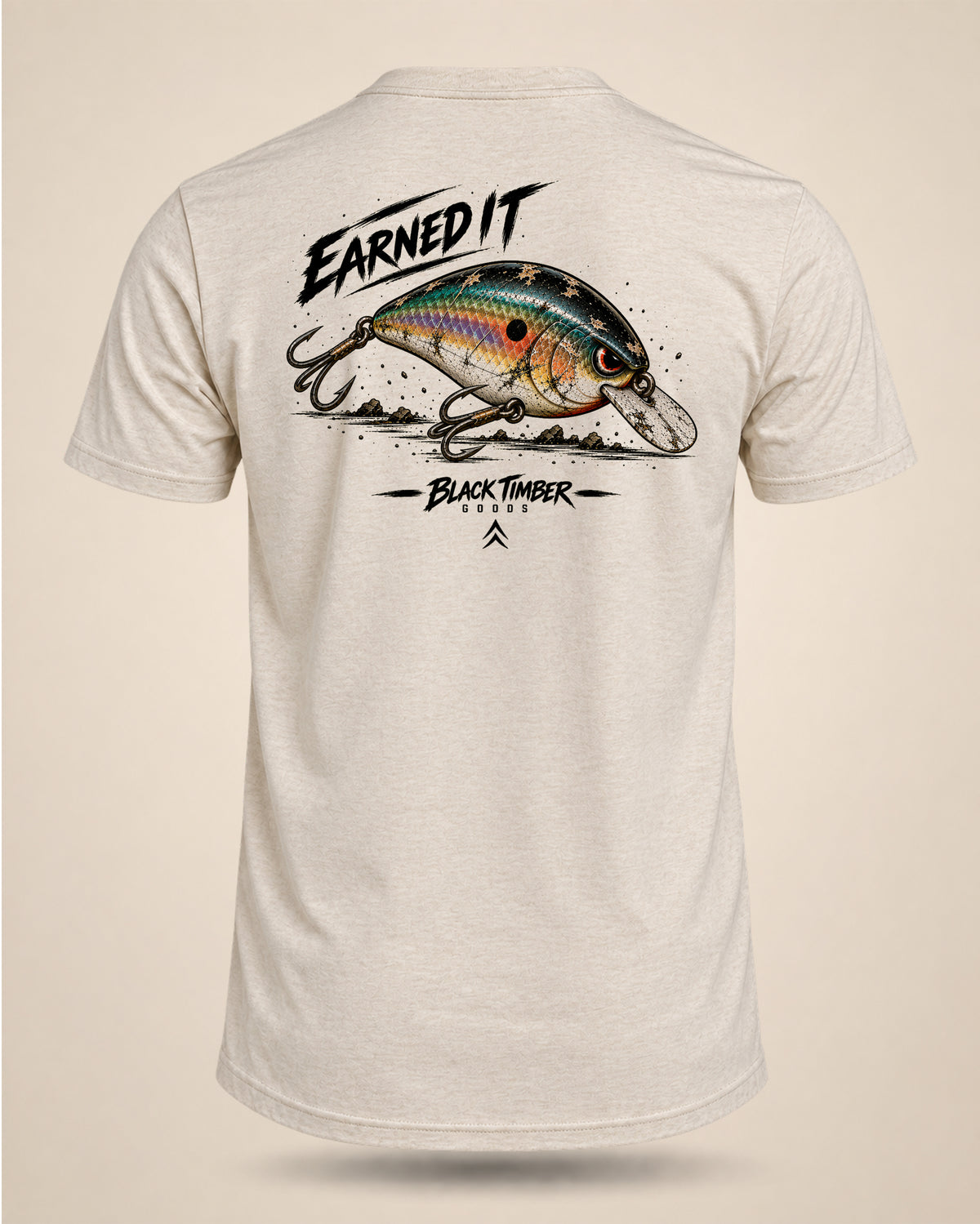 Cream Earned It bass fishing T-shirt featuring a colorful squarebill crankbait graphic with distressed detailing on the back.