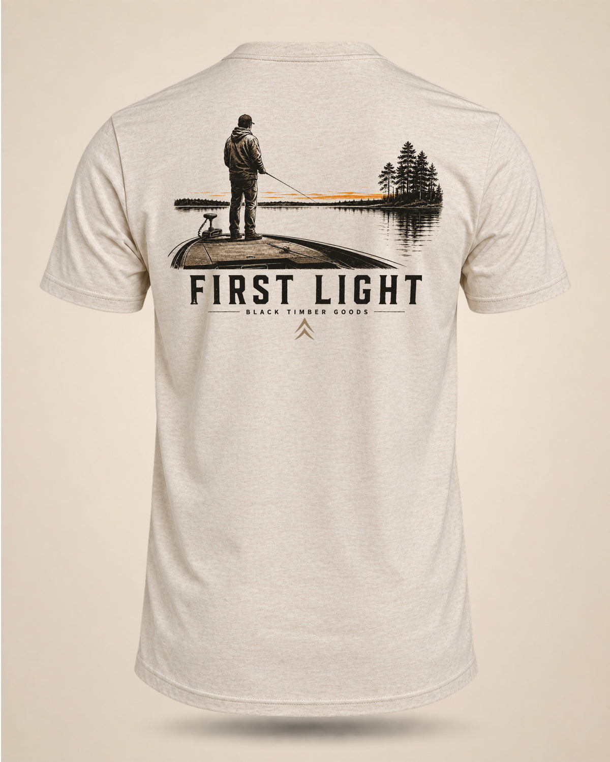 Cream First Light bass fishing T-shirt featuring an angler standing on the bow of a bass boat at sunrise on the back.