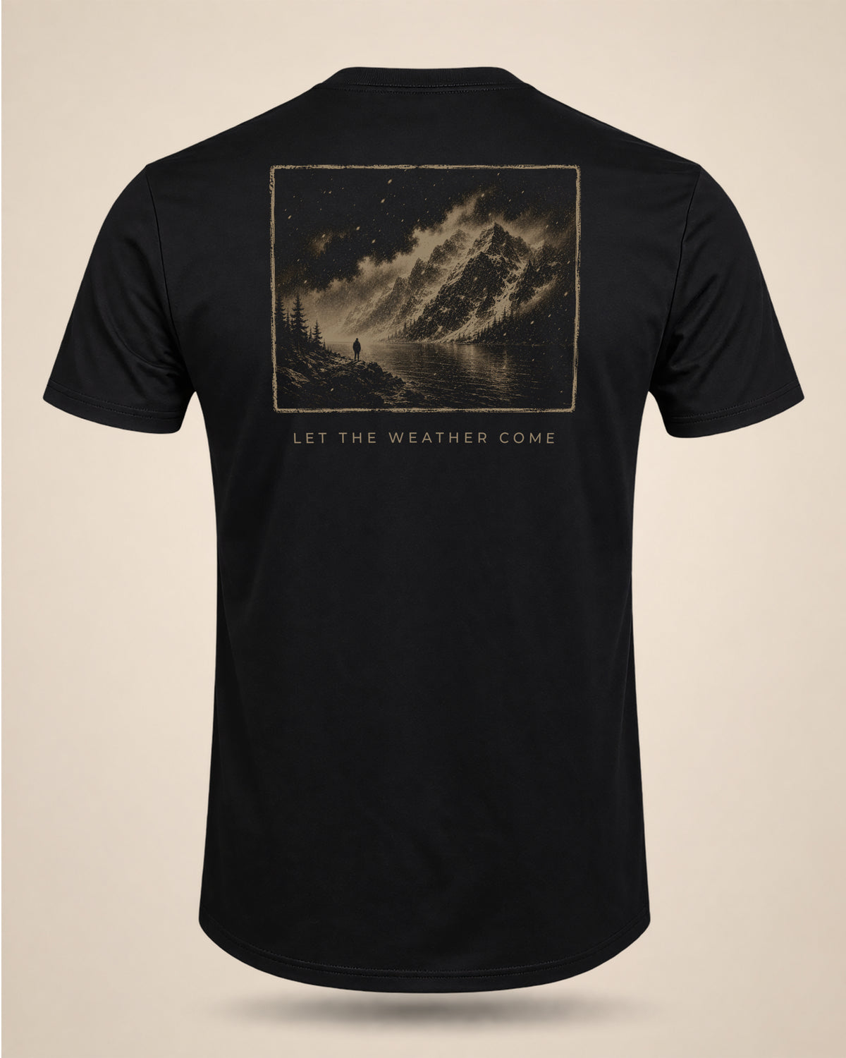 Black Let The Weather Come T-shirt featuring a moody mountain and storm-cloud graphic on the back.