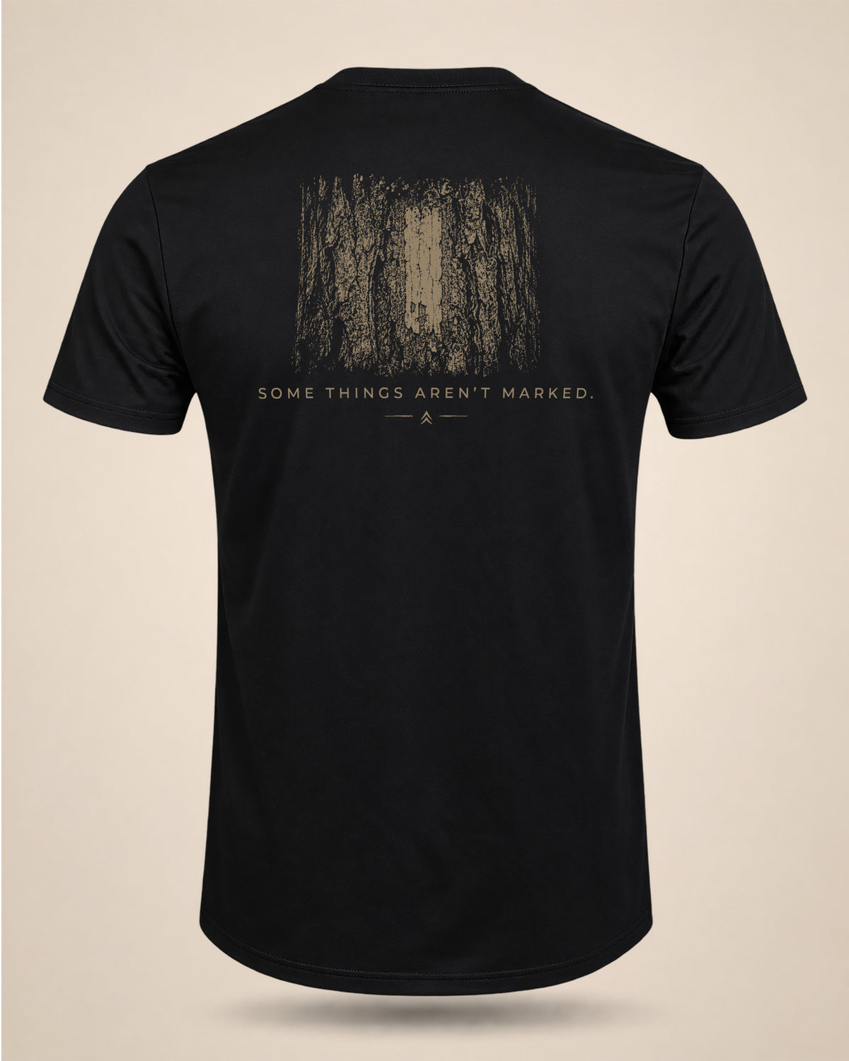 Black Some Things Aren’t Marked T-shirt featuring a weathered trail-marker graphic on the back.