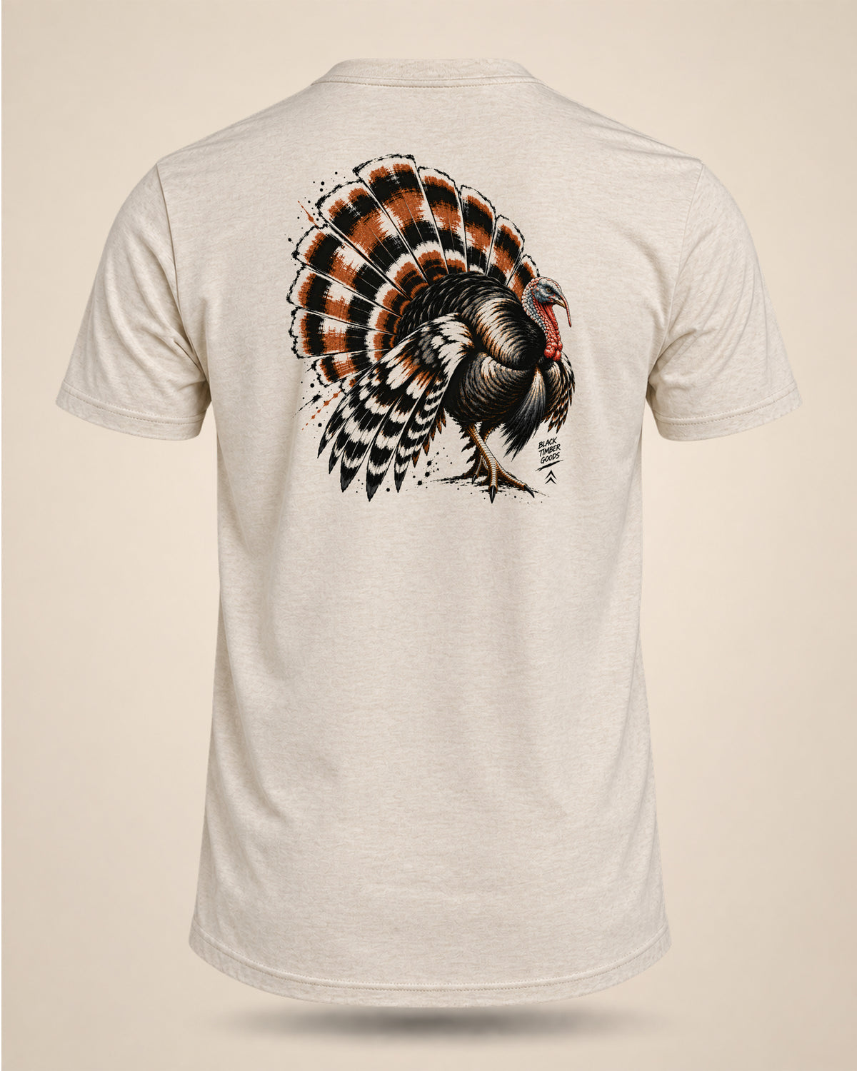 Back view of cream The Fan turkey hunting t-shirt with strutting wild turkey graphic