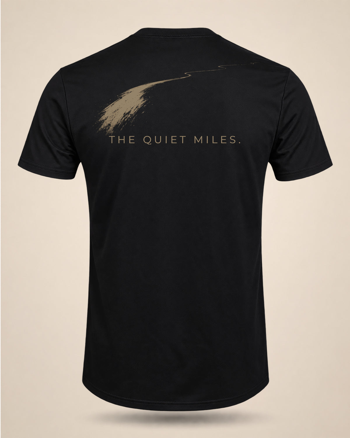 Black The Quiet Miles T-shirt featuring a minimalist road-inspired rear graphic.