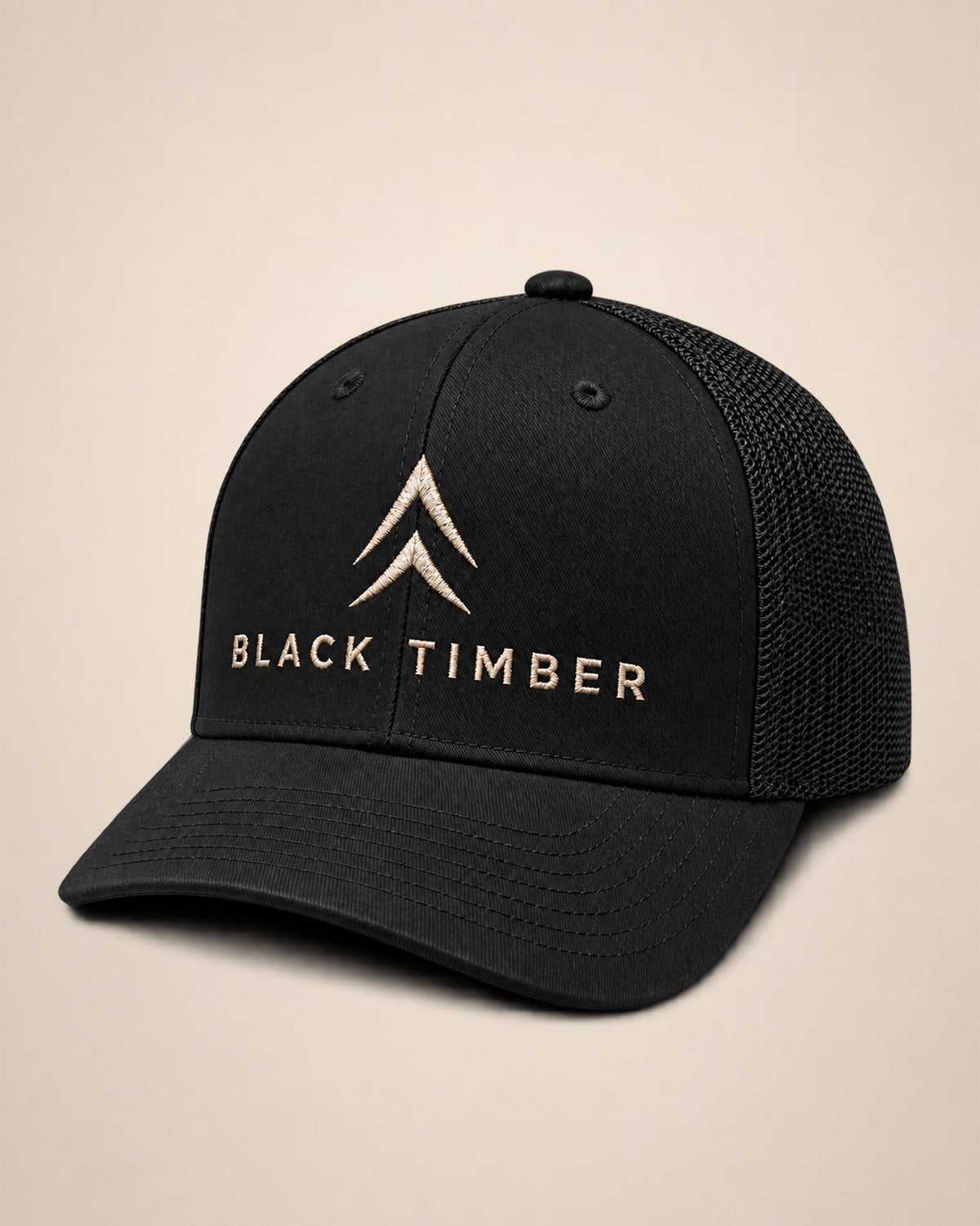 Black Timber Mark trucker hat with cream Alpine Chevron and Black Timber embroidery on the front.