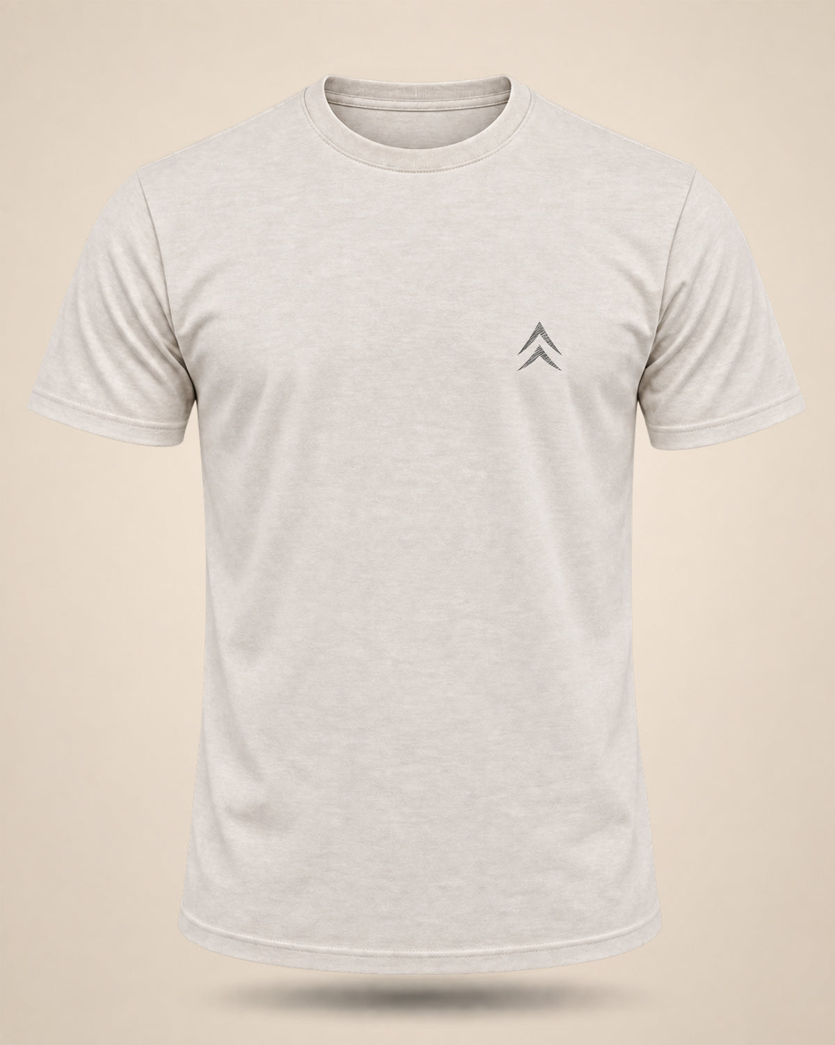 Front of a cream Black Timber Goods T-shirt featuring the Alpine Chevron chest mark.