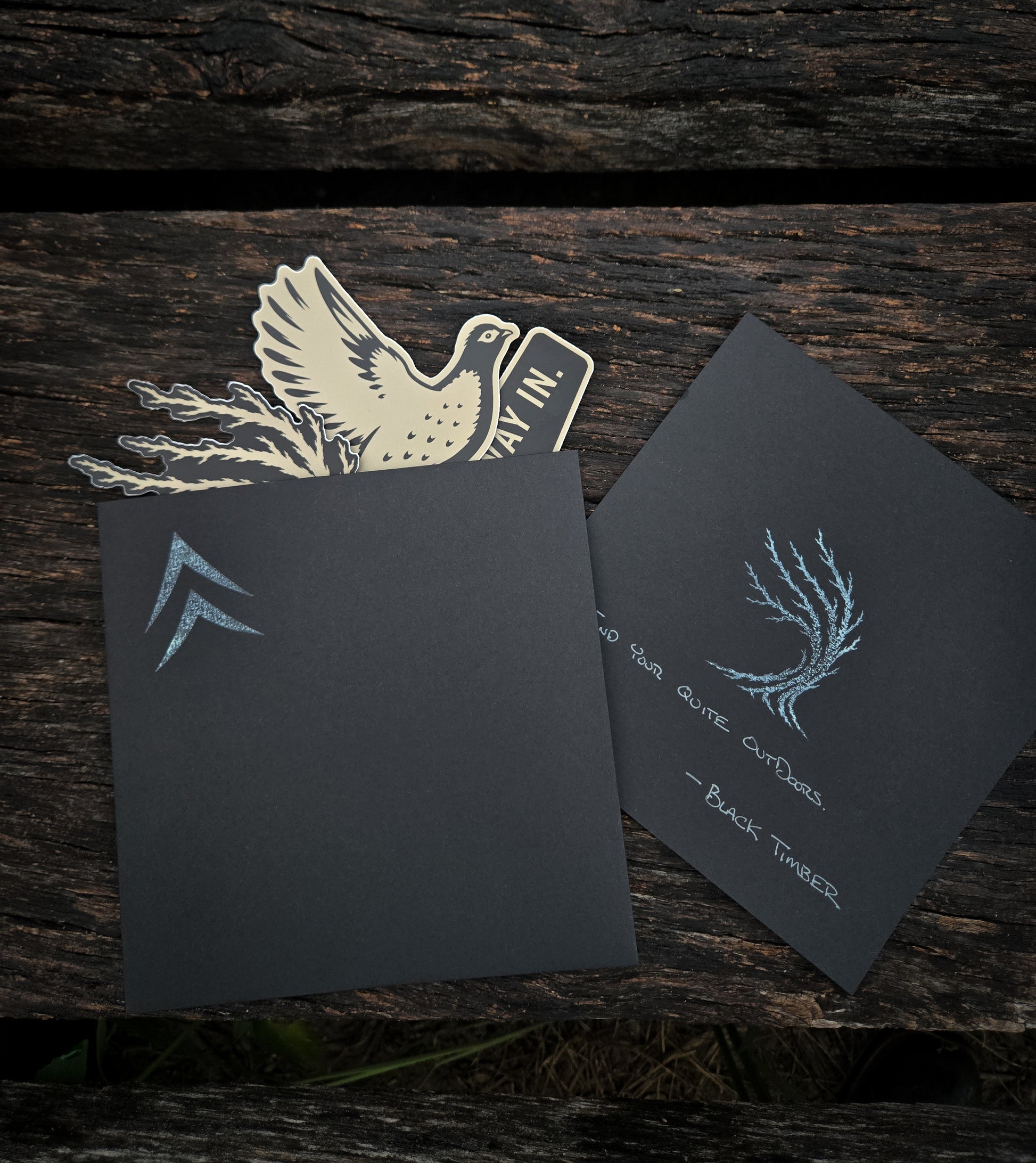Black Timber Goods sticker pack with packaging.