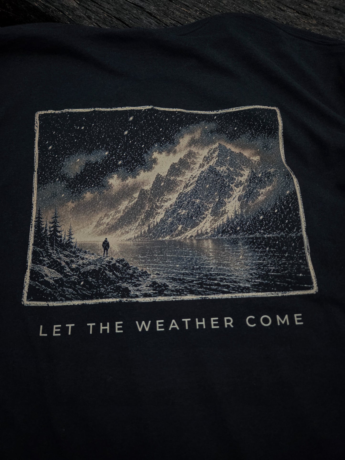 Close-up of the Let The Weather Come mountain weather artwork.