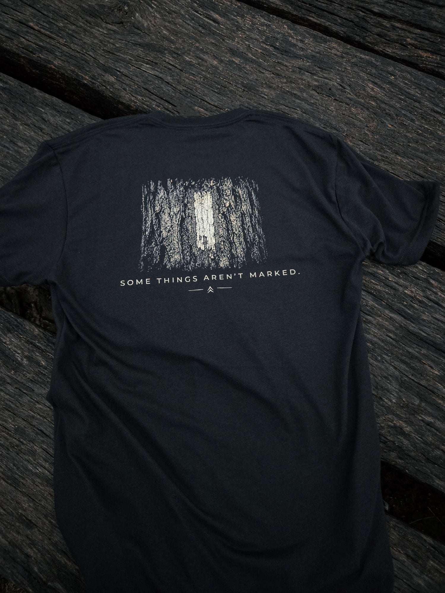 Back of Some Things Aren't Marked trail blaze shirt by Black Timber Goods featuring a weathered trail blaze graphic.