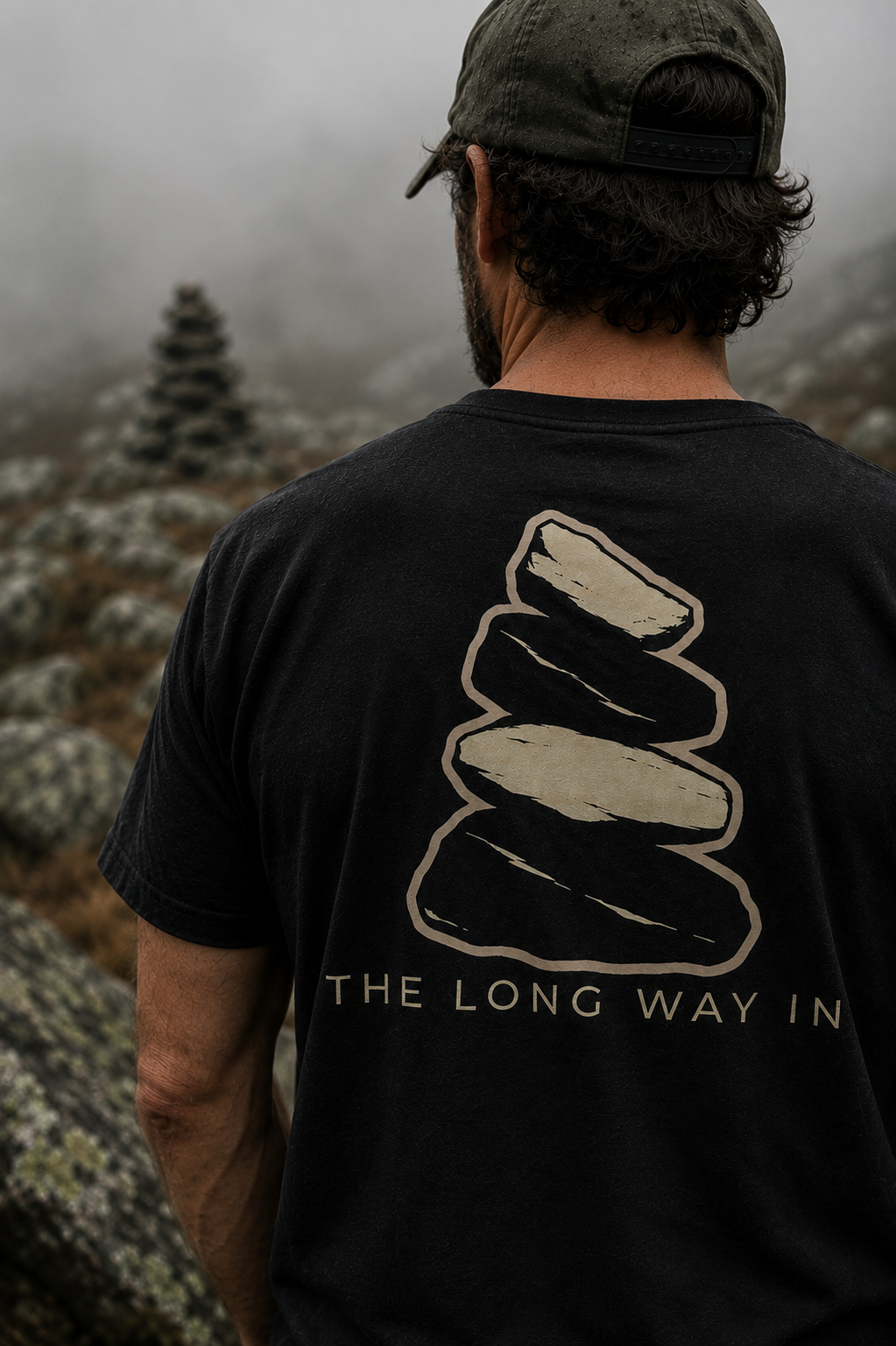 Person wearing The Long Way In cairn shirt by Black Timber Goods on a forest trail.