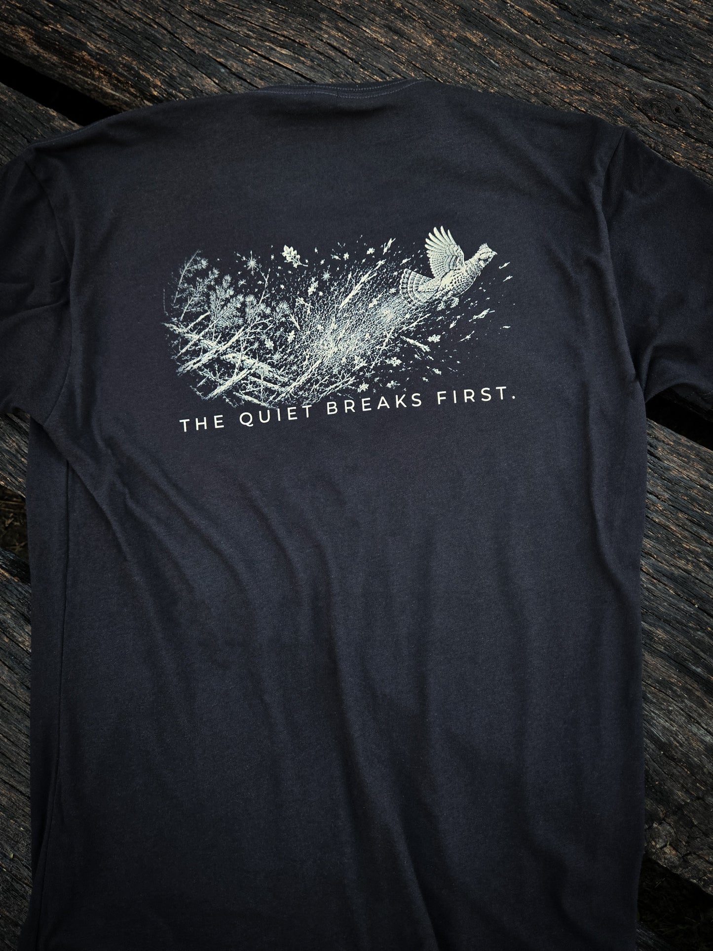 Back of The Quiet Breaks First grouse shirt by Black Timber Goods featuring a grouse flush graphic.