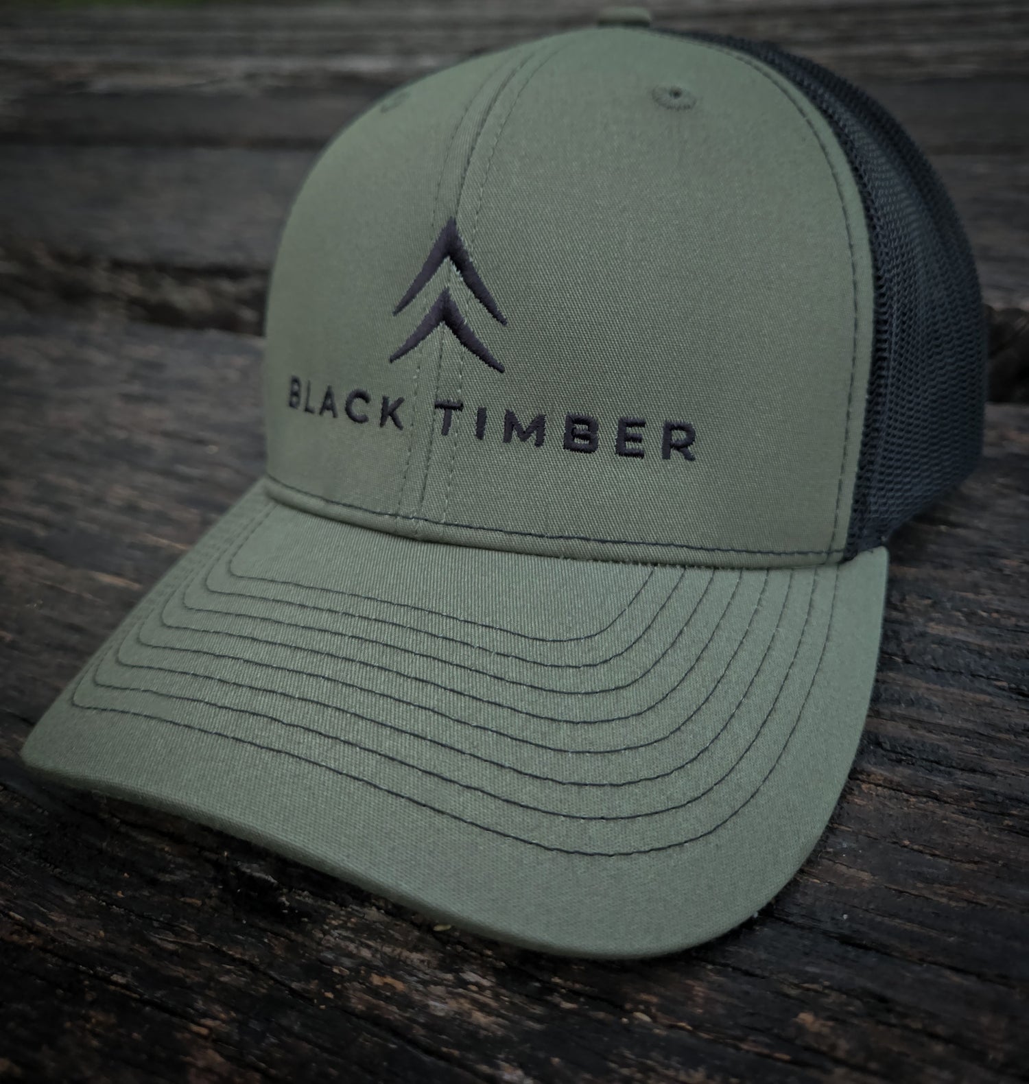 Front of the Timber Mark Richardson 112 trucker hat by Black Timber Goods in olive with tonal embroidery.