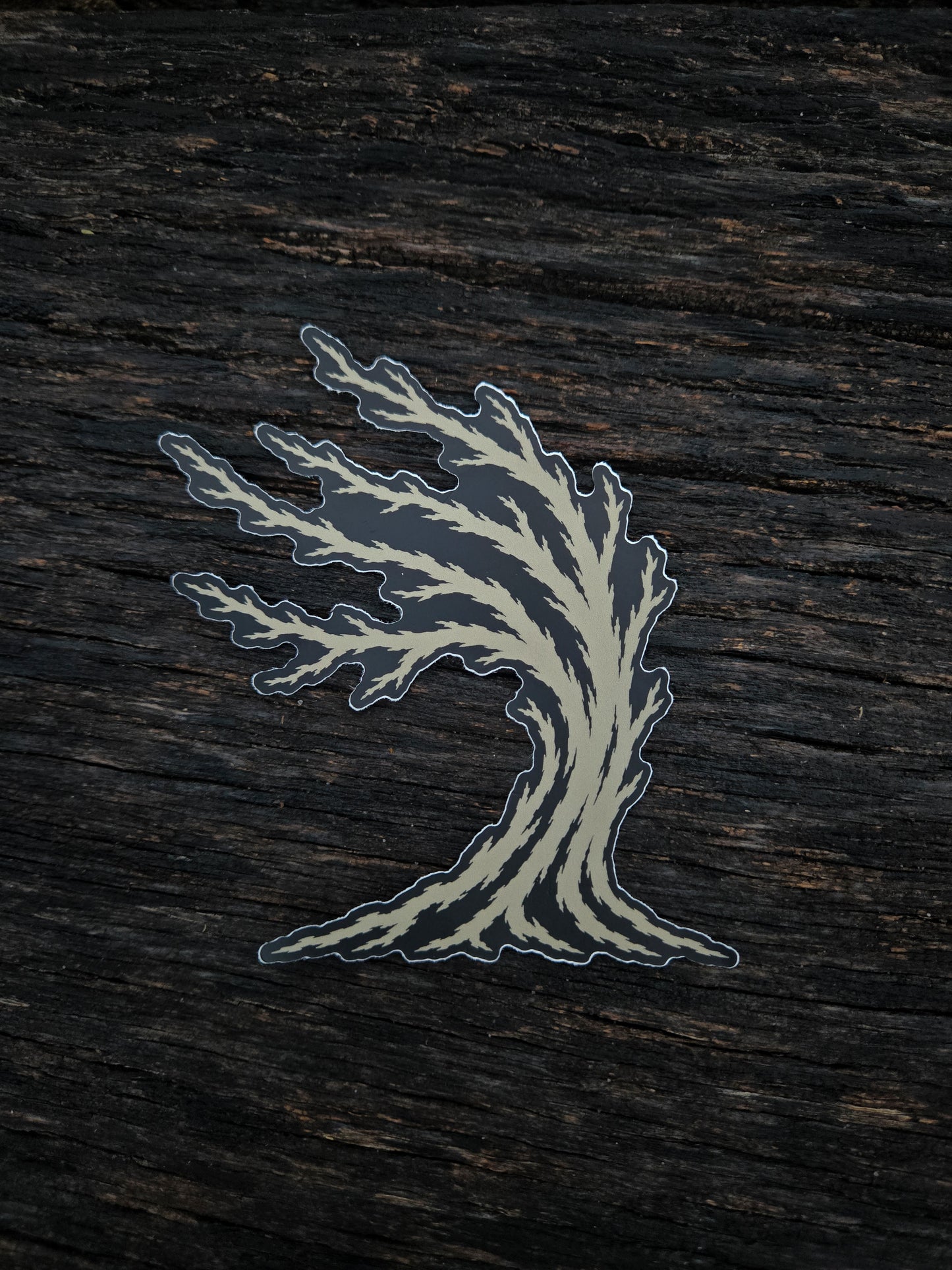 Weather Tree waterproof vinyl sticker by Black Timber Goods on weathered wood.